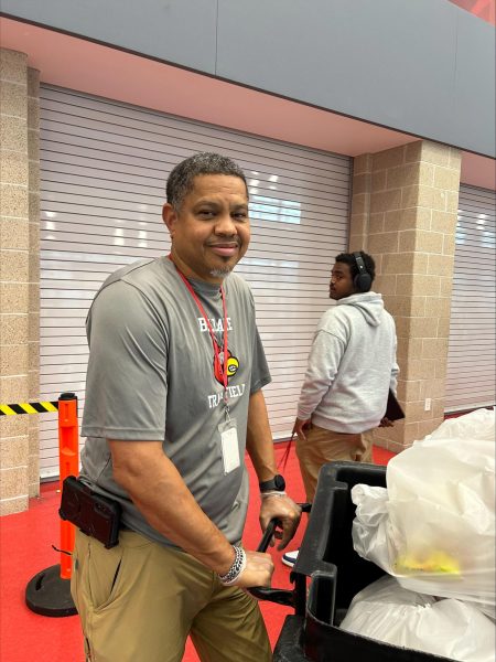 Building service manager Glenn Parker cleans up the cafeteria after Cardinal Hour. He said that while some people look down upon his job, he views his first year at Bellaire as "what he was looking for."