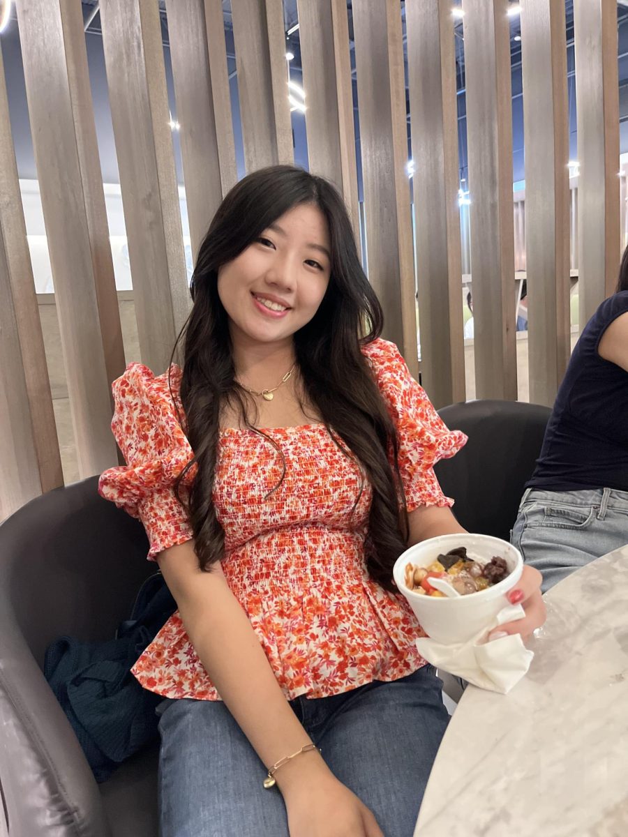 Stacey Shih poses for a picture. Shih, age-wise, is a year ahead of her peers. "Even though it was only one year that I skipped, there was definitely a difference, not [only in] the curriculum, but also in how other students would see each other," Shih said.