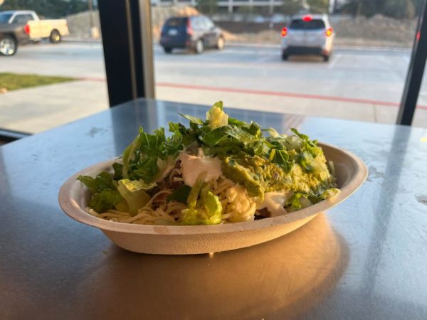 This is the bowl I created. The heavy amount of guac turned it green when I ate its leftovers the next day for lunch. The leftovers had an amazing cheese pull!