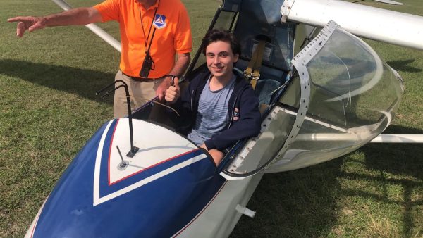 Sophomore Benjamin "Benji" Kotlyar after landing his glider. He has been flying for four years.