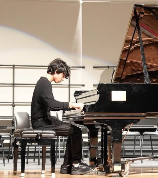 Junior Akhil Baker performs the piano at the 2023 Music as Medicine concert for a fundraiser. He plays Hungarian Rhapsody No. 11 by Liszt.