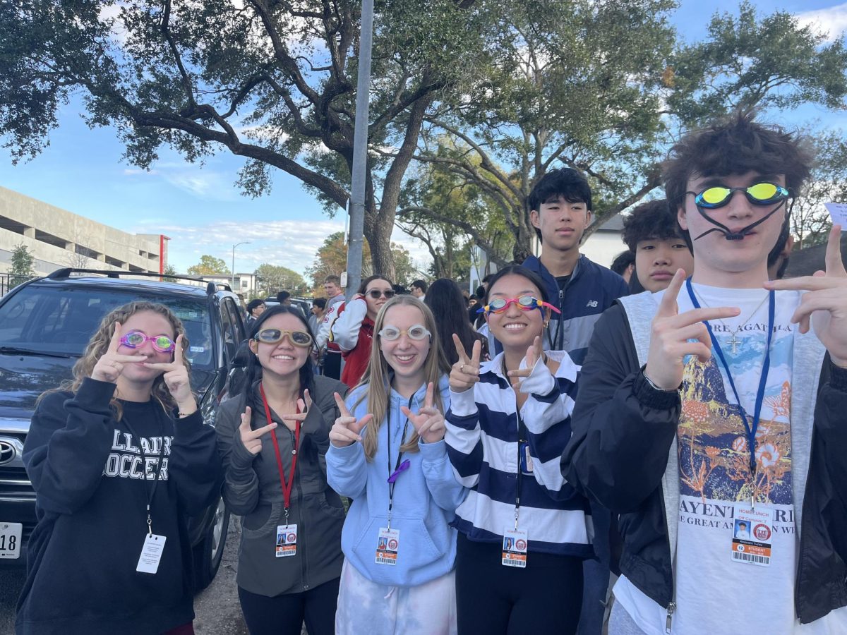 Seniors Olivia Leatherman, Allyson Nguyen, Lindsay Tennant, Madelyn Leung and Alejandro Turley wear their goggles during a fire drill. Although players can not be eliminated in the school building, attacks are permitted in all areas outside.