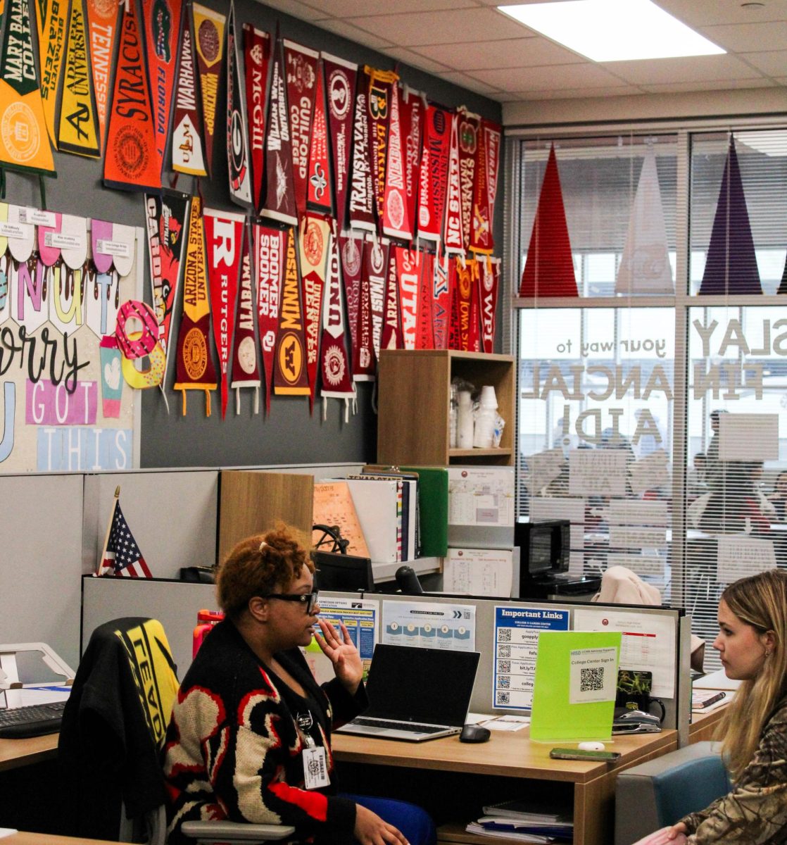 College and career advisor Alivia Graham meets one-on-one with a student. She is one of three college counselors. 