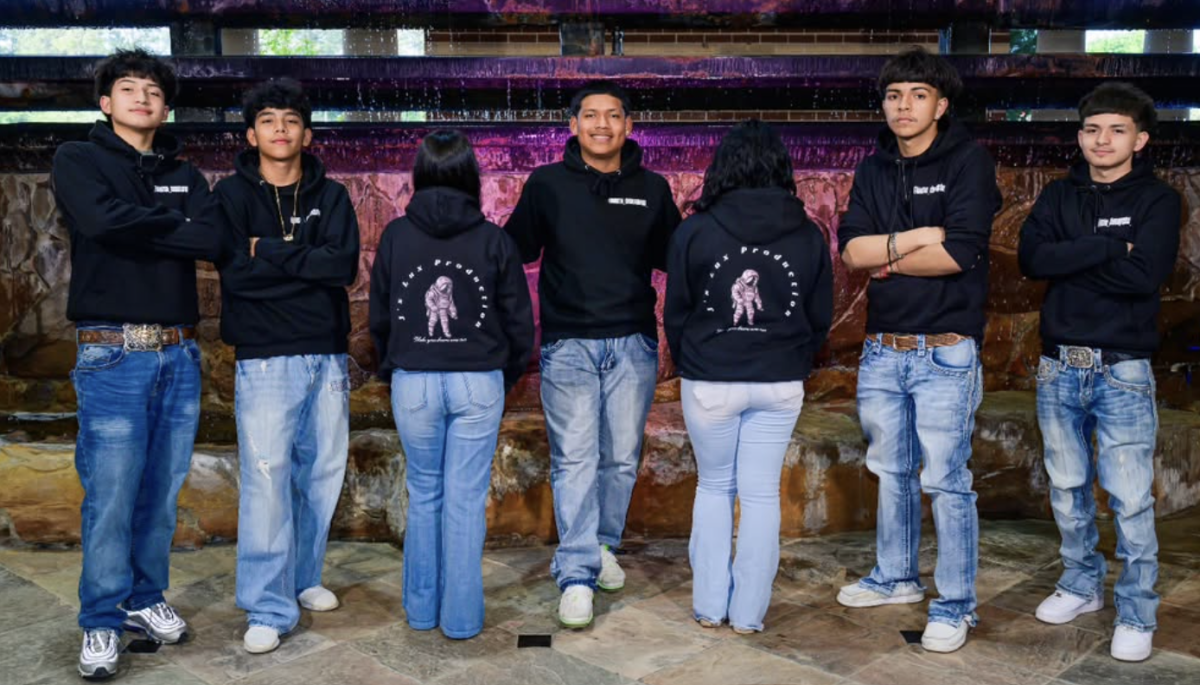 Hernandez stands in the middle of a photoshoot for the 2024 Rumbatony Fashion Expo. J's Lux participated in the largest Latin Quinceañera festival in Texas.