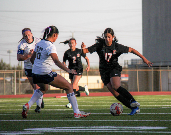 Babajanov and junior Meadow Lam ensure the team keeps possession of the ball. Babajanov tried to transition the ball to the offensive side of the field to score.