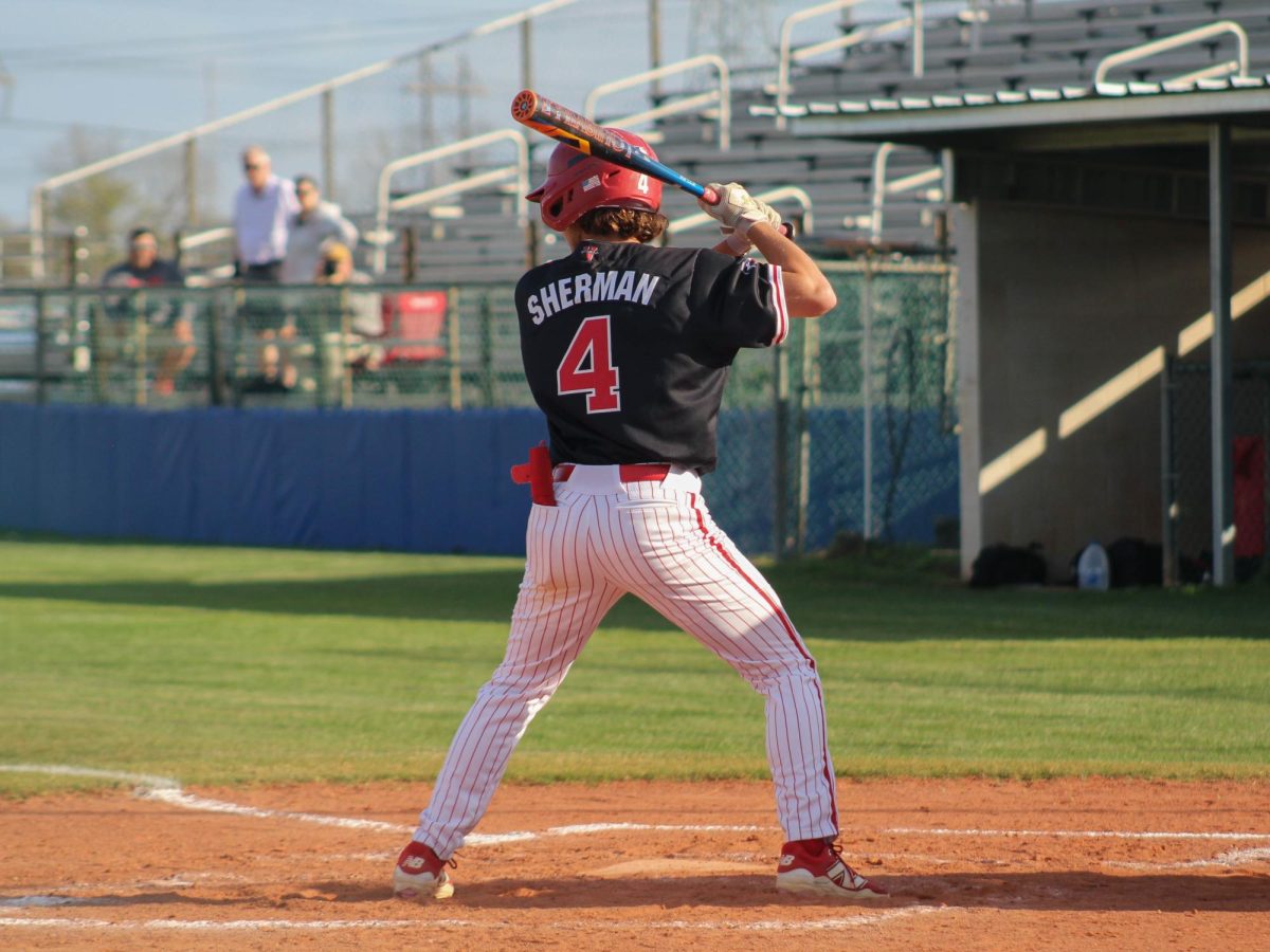 Senior Gavin Sherman goes up to bat at the Bellaire vs. Westside game on March 18. Sherman primarily plays second base and outfield.