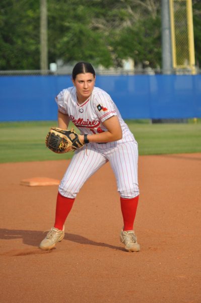Junior catcher and third baseman Lauren Magid looks to field the ball. Magid has verbally committed to play softball at Emory University.
