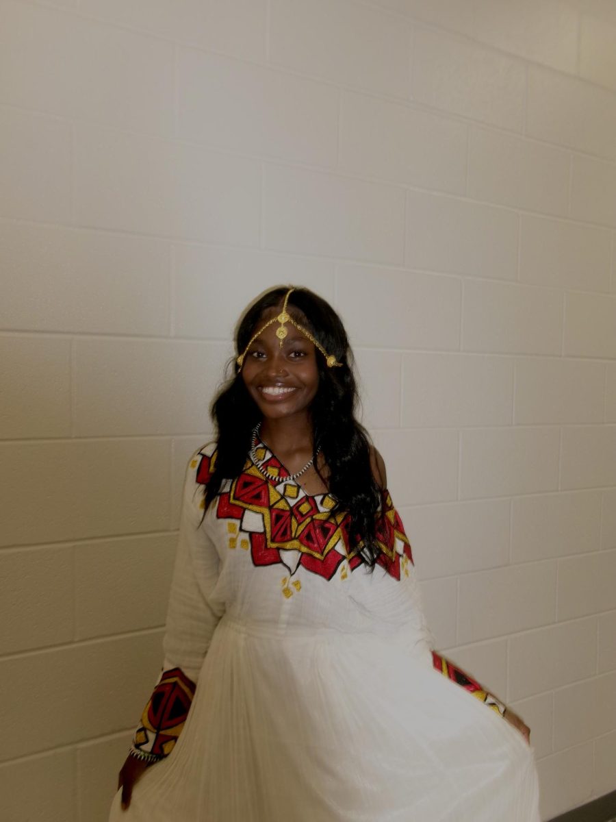 Senior Abrehet Sale waits to go on stage at BISA Fest. Club member Aya Aman suggested taking photos of Sale to keep her from panicking over the fact other club members weren’t there yet.
