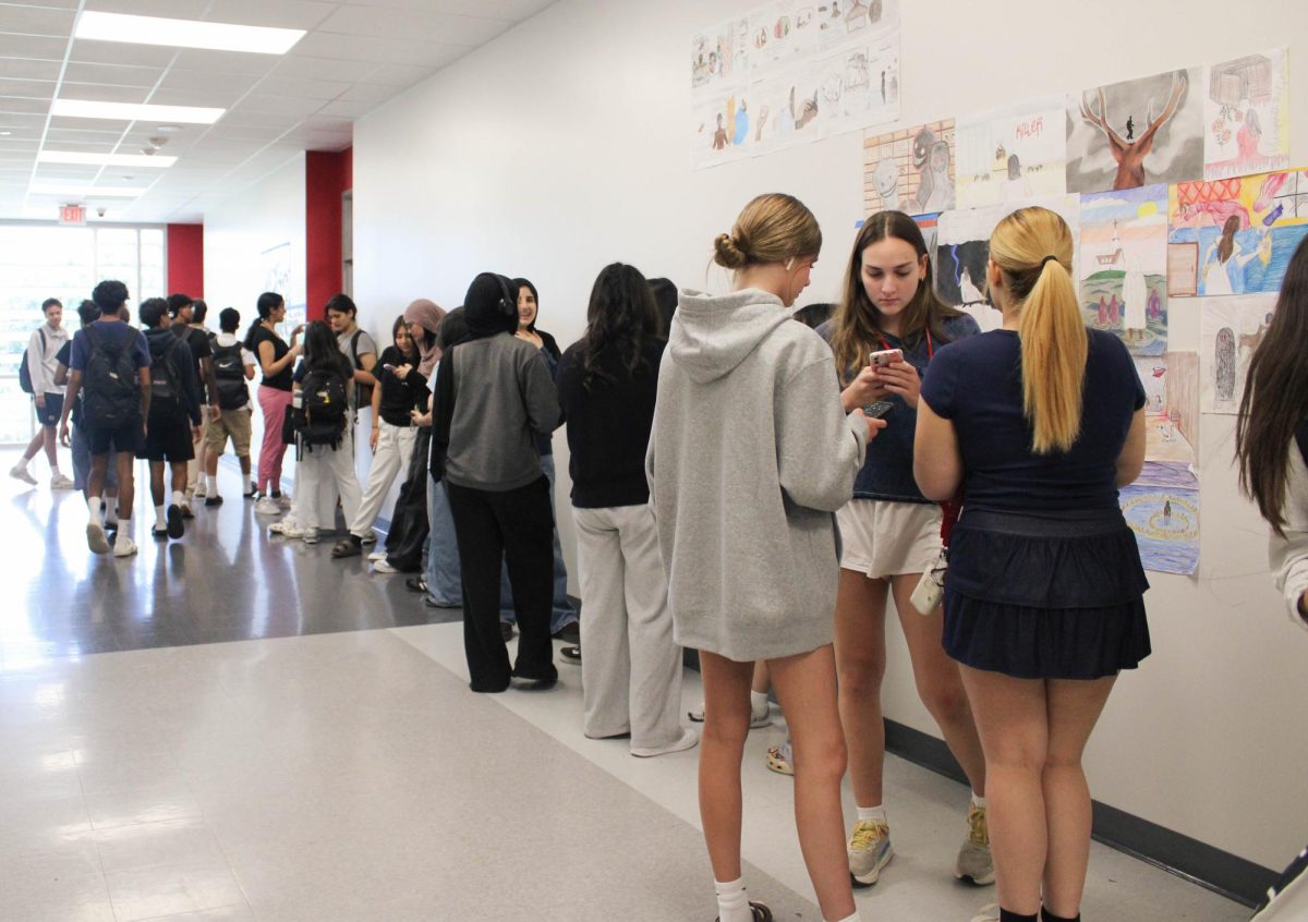 Culinary Club members wait in line for drinks at Room 2712. The event took place during the entirety of Cardinal Hour on May 27.