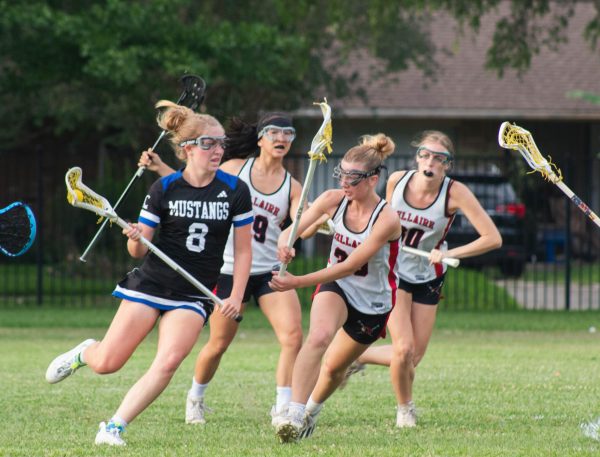 Senior Rachel Kohl defends as the Houston Christian mustangs make their way closer to their goal. Kohl attends Ridge Point High School in Fort Bend ISD but plays for the Bellaire Cardinals since Ridge Point does not offer lacrosse as a sport.