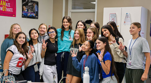 Pathologist and YoungLife leader McKenna Compton poses with YoungLife members at Neurology Club's first meeting. The meeting took place during the first half of Cardinal Hour on Thursday, Sept. 18.