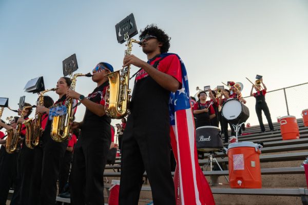 Senior and saxophone section leader Rahul Nanjundan performs in the halftime show at the Bellaire vs. Pasadena game at Butler Stadium on Sept. 12. Nanjundan said he will miss the community of the band most after he graduates.
