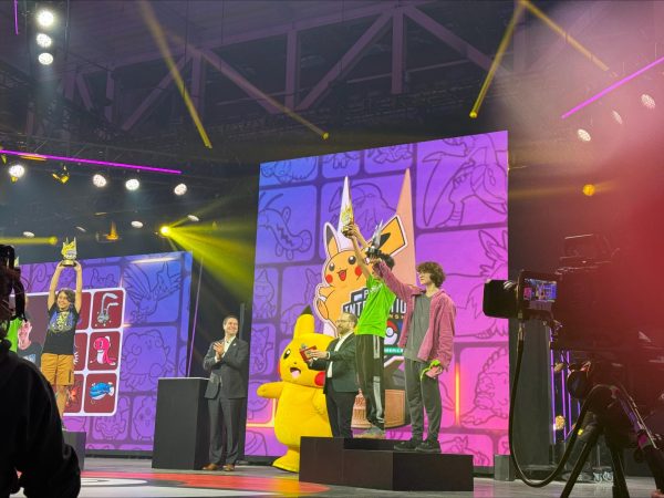 Stephens and his opponent in the Senior VGC final round hold up their trophies at the award ceremony. According to Stephens, being on the final stage was “surreal.”