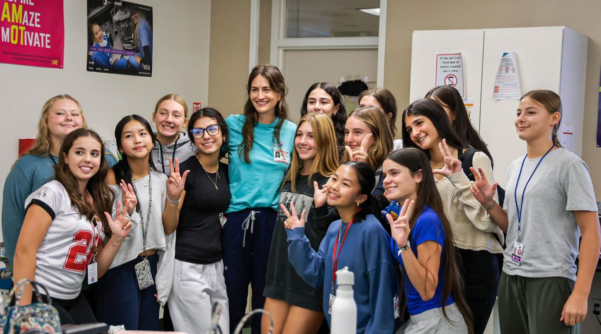 Pathologist and YoungLife leader McKenna Compton poses with YoungLife members at Neurology Club's first meeting. The meeting took place during the first half of Cardinal Hour on Thursday, Sept. 18.