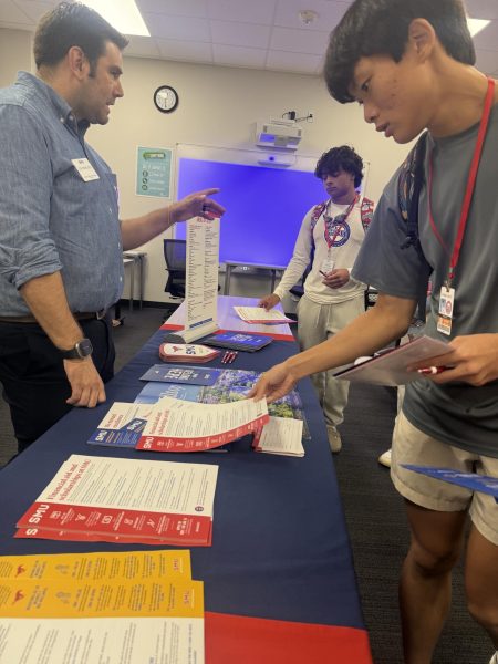 Houston Regional Director of Admissions Joe Francisco shares more information about the SMU campus. Scholarship information, campus life information and brochures were laid out on the table for students to take.