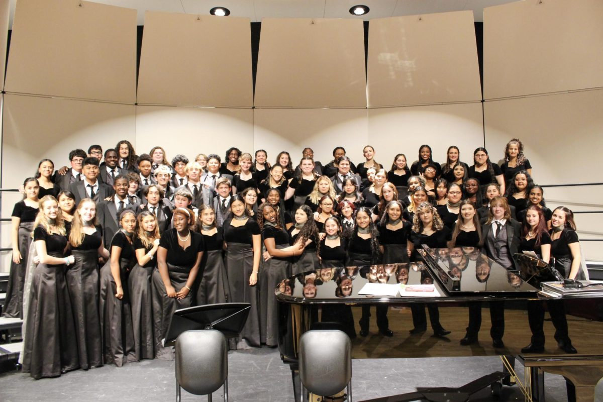 The Bellaire Choir smiles at the camera. The photo was taken minutes before the two-hour-long concert began.
