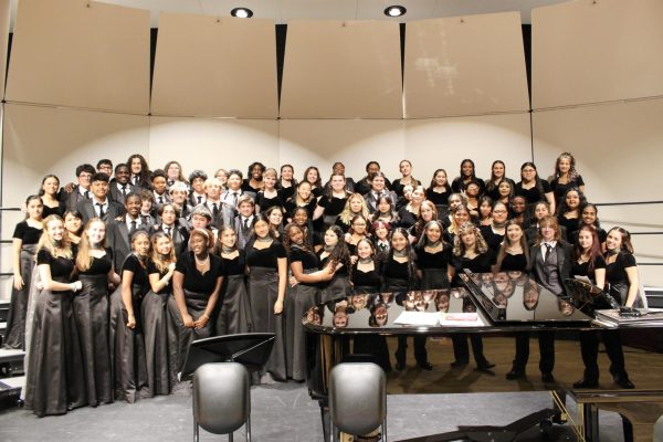 The Bellaire Choir smiles at the camera. The photo was taken minutes before the two-hour-long concert began.