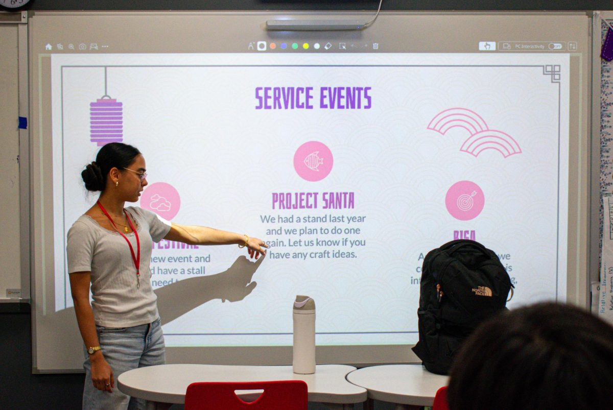 President and junior Mallika Mohan presents the various service events the Southeast Asian Student Association plans to organize. One event is Project Santa, which the club held last year and hopes to continue this year.