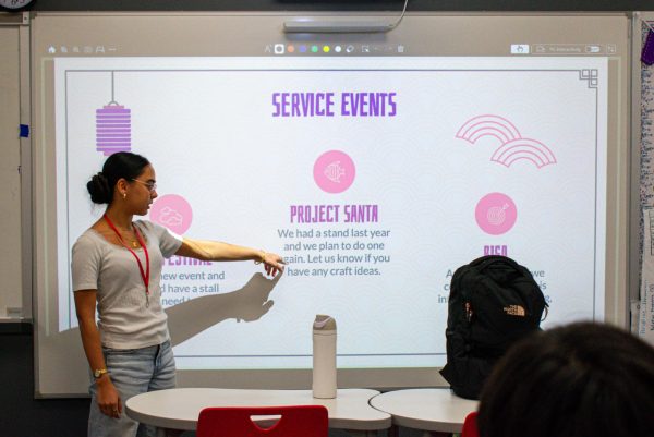 President and junior Mallika Mohan presents the various service events the Southeast Asian Student Association plans to organize. One event is Project Santa, which the club held last year and hopes to continue this year.