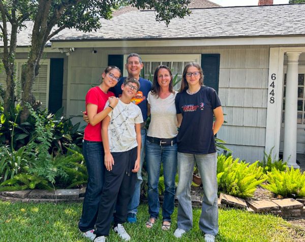 Junior Letizia Giunchi stands in front of her mother’s former host family’s home. It was Giunchi’s final day with her family before they returned to Italy.