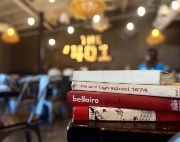 The 401 has a collection of past Bellaire yearbooks. “Sometimes people will draw something by their names if they have a pic in the book, and sometimes they will write notes for a friend or fellow grad to find when they come in,” Kristi Coffey said. 