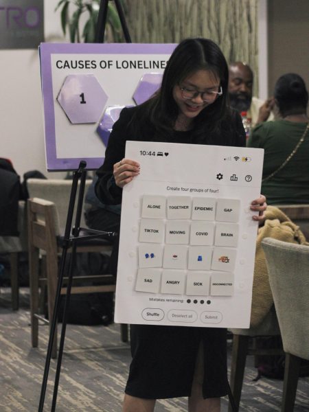 Teo practices the beginning of her speech on loneliness in the hotel lobby in Atlanta, starting off with her board showing the New York Times’ Connections game. Teo advanced to the semi-final round of the Barkley Forum tournament, acquiring one of two bids needed to qualify for the Tournament of Champions.