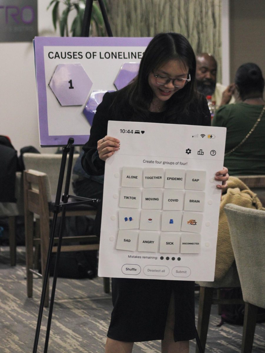 Teo practices the beginning of her speech on loneliness in the hotel lobby in Atlanta, starting off with her board showing the New York Times’ Connections game. Teo advanced to the semi-final round of the Barkley Forum tournament, acquiring one of two bids needed to qualify for the Tournament of Champions.