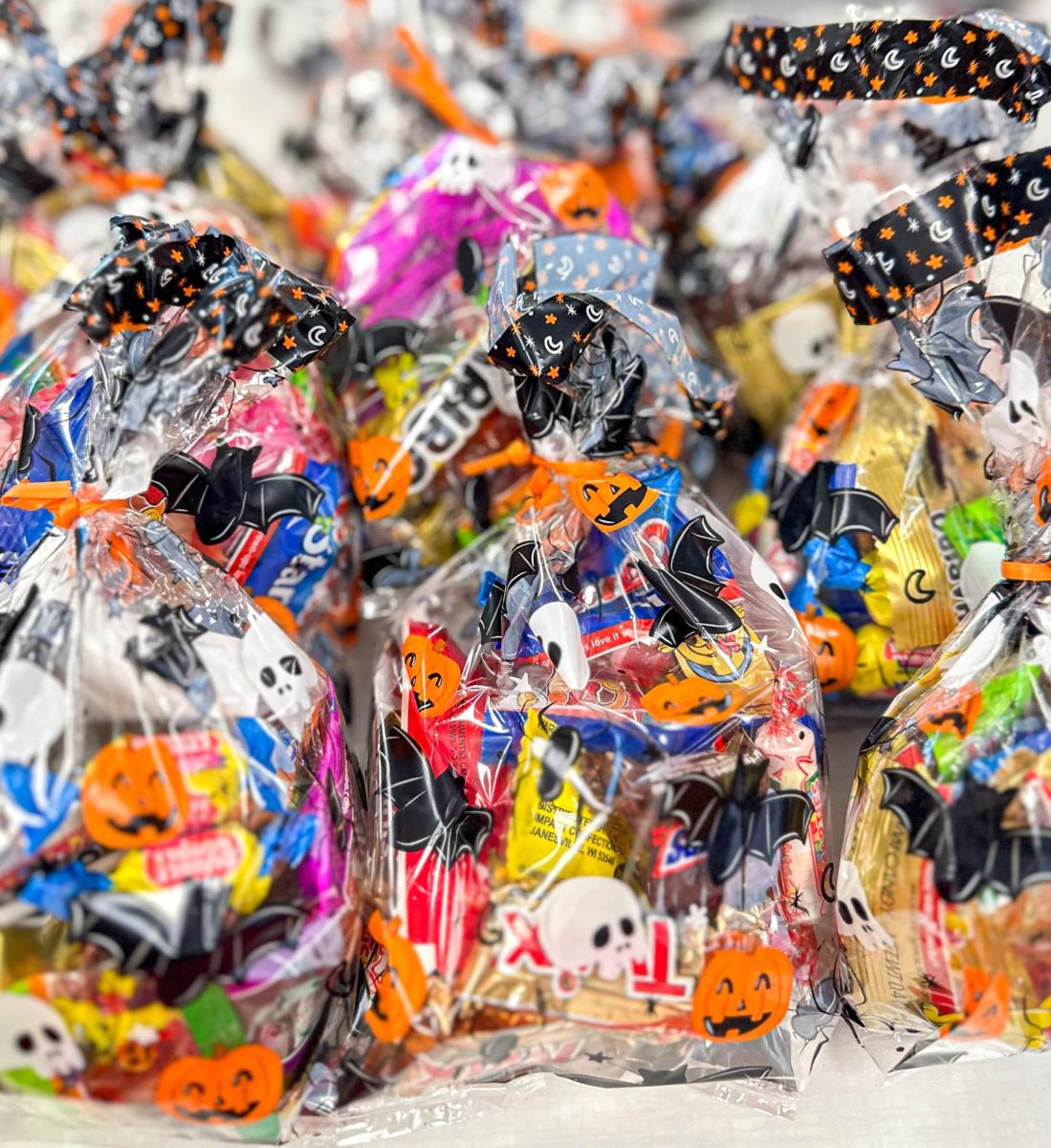 The National Beta Club stuffs candy goodie bags with different kinds of treats and candies. The bags were donated to the Nehemiah Center, emphasizing the importance of service to the community.