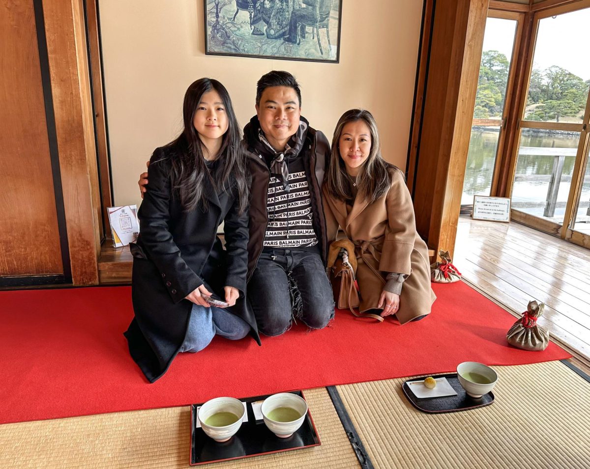 The Nguyen family drinks tea at the Nakajima Tea House in Tokyo. They celebrated Christmas Eve by participating in Japanese customs at the traditional teahouse.