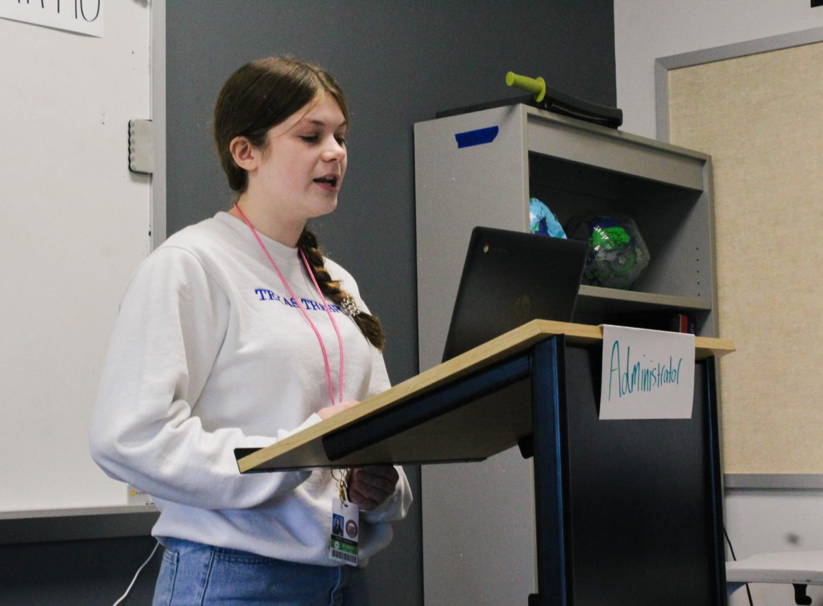 Lawrence gives her speech in support of the bill. She had worked and drafted the speech before the simulation.