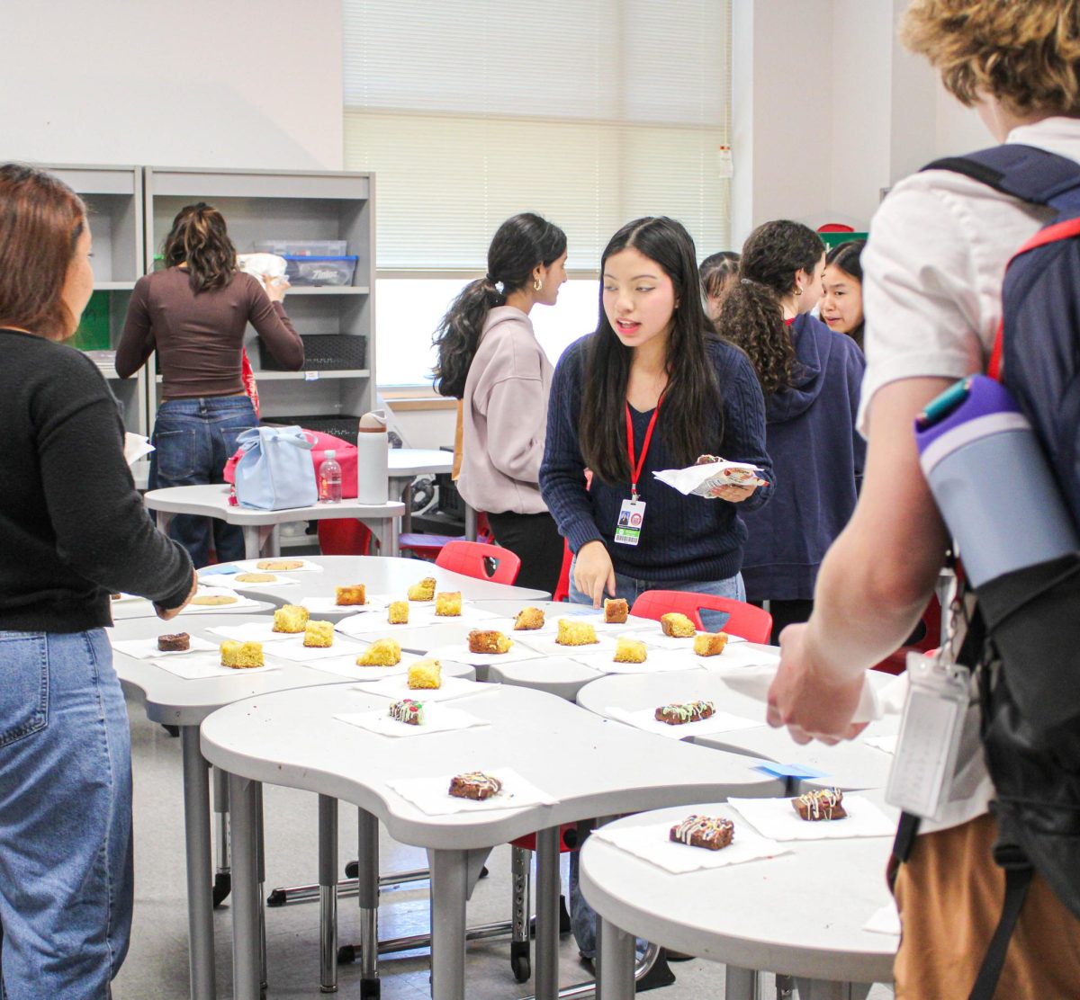 National Beta Club and Dessert Club members pick out the treats they want to eat. Over 30 people came and observed the treats the clubs had set out. 
