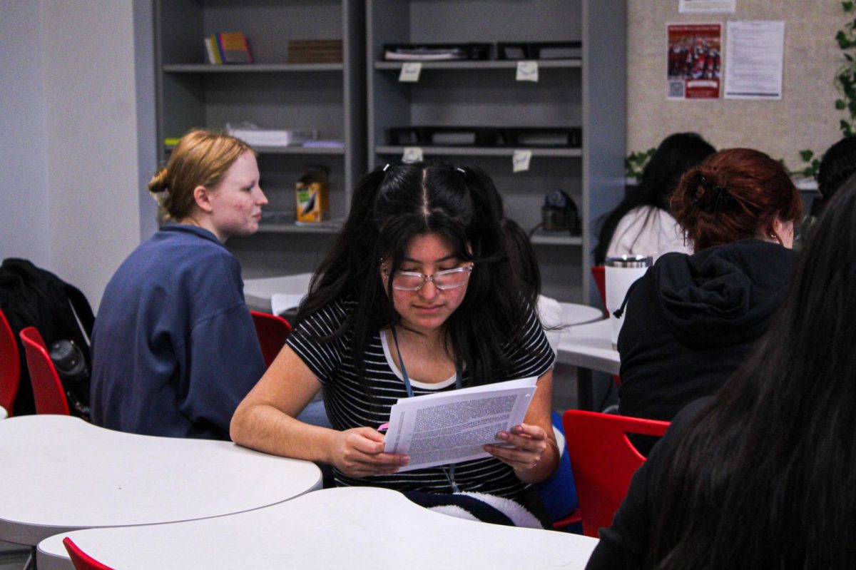 Senior Gladys Tumax reads her character's quotes. Over the next few meetings, characters on the prosecution and defense will split up and devise their arguments to try and win their side for mock trial.