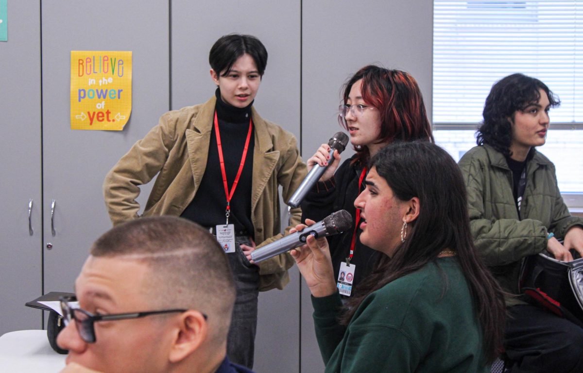 Junior Wesley George sings a duet of “Rewrite the Stars” from “The Greatest Showman”. The pair’s on-the-spot harmonies carried throughout the room and out into the hallway, drawing in more participants. 