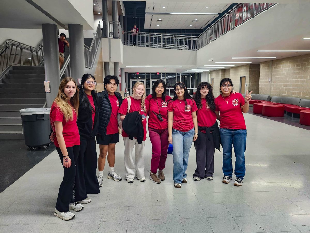 The Academic Floor 1 team takes a picture after all cleanup was concluded for their floor. Sophomore Drake VasquezOrdonez (third from left) was assigned to help on Floor 1 after finishing competition in policy debate. 