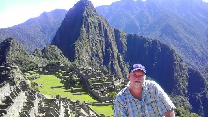 Jeff Turner stands in front of Machu Picchu on one of his trips to Peru. Turner had gone to Machu Picchu on the 100th anniversary of its discovery, receiving a special stamp in his passport.