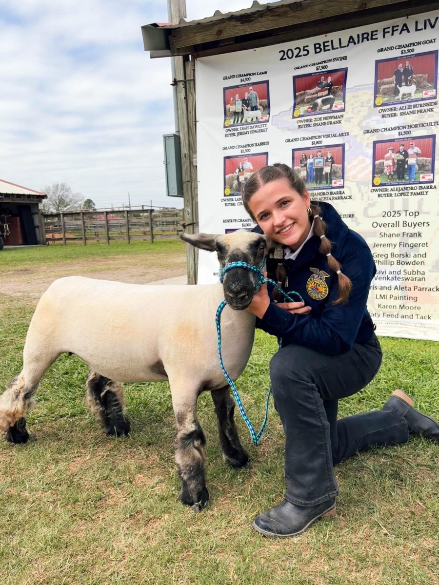 Senior Grace Warner and Millie pose for a photo on auction day, which Millie did not participate in. Millie’s buyer was set at this time, and plans were already in place for Millie’s new home in Brookshire, Texas. 