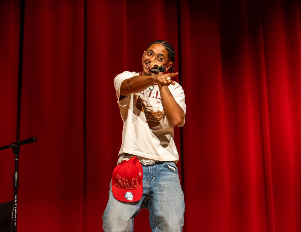 Sophomore Yousany Keyklyn Grenot points toward the audience while performing. Grenot sang “Just the Two Of Us” by Bill Withers, Ralph MacDonald and William Salter and “Shallow” by Lady Gaga, Mark Ronson, Anthony Rossomando and Andrew Wyatt.