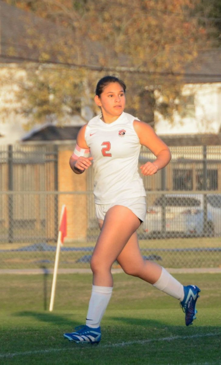 Cortez runs back to defense in a soccer game against Episcopal High School. Cortez was one of the two JV girls soccer captains this year.