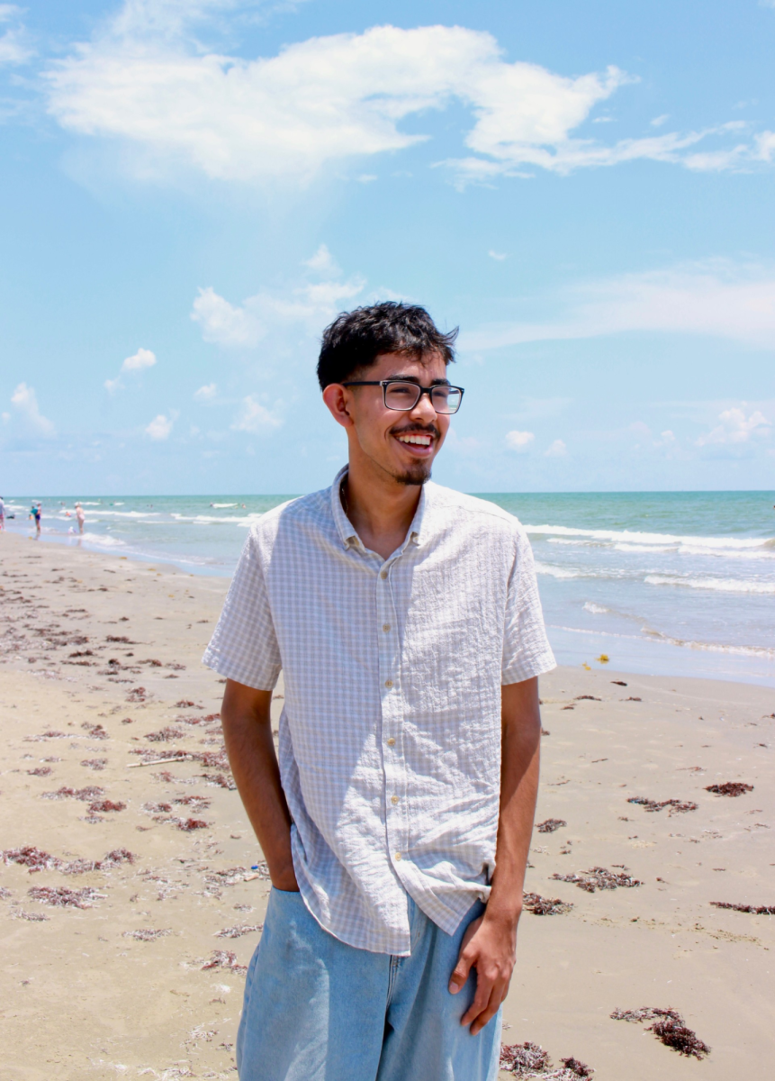 Senior and choir president Carlos Mata poses on a Galveston beach at this year’s choir officer bonding trip. Choir officers shared a beach house for two to three days before the school year began to get to know each other better.