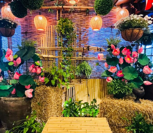Pink lotus blossoms and beautiful lanterns decorate Hương Sen’s Interior. Its lush decor sets an enchanting energy for the meal ahead.