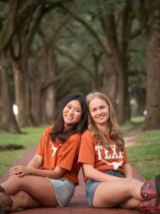Grobler sits beside Tsang wearing University of Texas at Austin shirts to celebrate their acceptances. The pair took their senior photos together to celebrate their continued friendship into college.